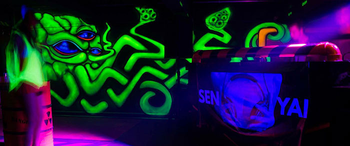 black light party squid mural art