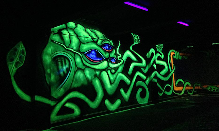 radioactive squid black light graffiti mural