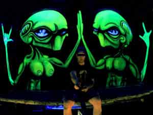 Black light alien graffiti on Bangkok art gallery