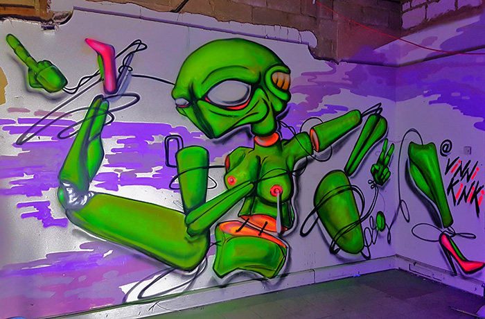 alien sex doll A.I. black light graffiti