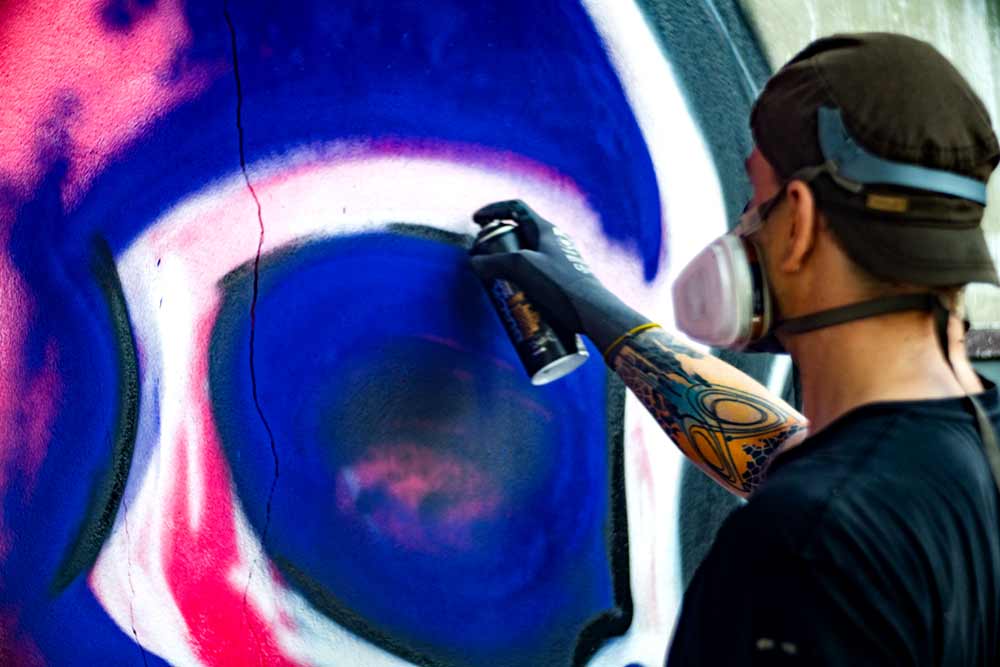 ViNNi KiNiKi live painting in progress for The Hechyeomoyeo closing party at Hugs Songwat in Bangkok Thailand