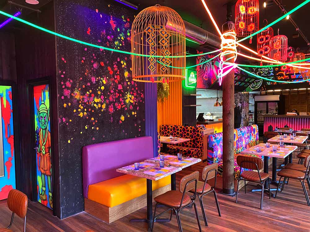 My Thai restaurant interior design concept Manchester Piccadilly featuring UV-Reactive Thai pop art theme art by ViNNi KiNiKi